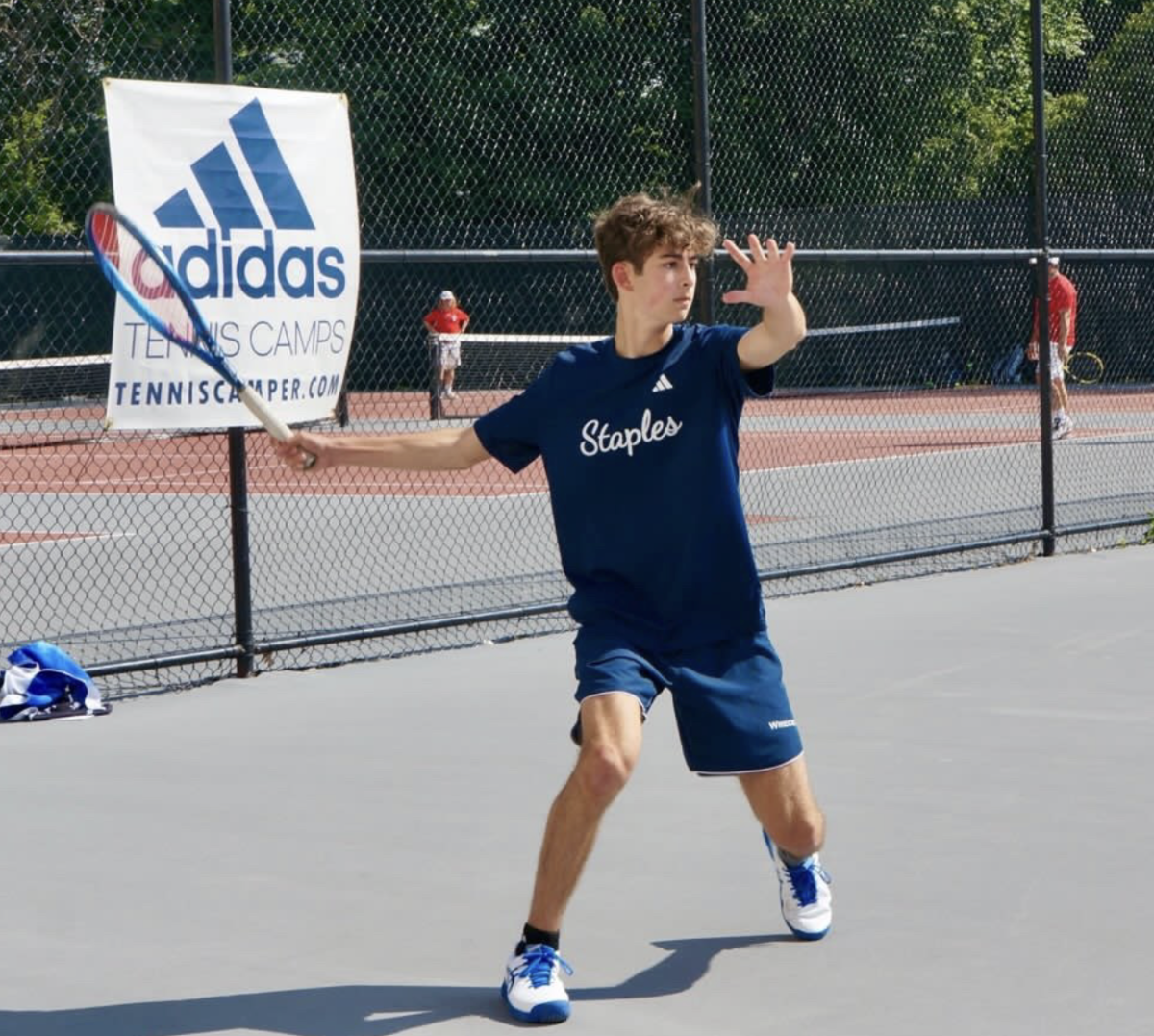 Noah Wolff ’25 gets ready to hit a forehand. Photo contributed by Noah Wolff.